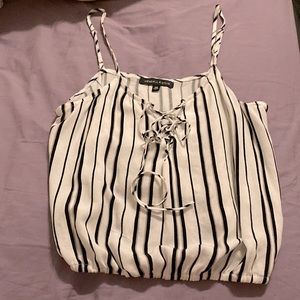 Kendall & Kylie; silky halter top is white w black stripes. Size XS